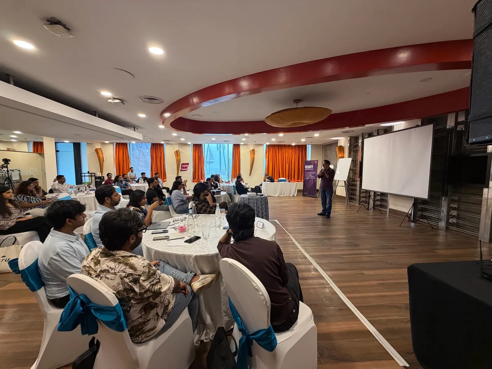 Wide view of a full corporate training room